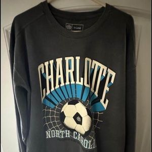Charcoal acid wash crew neck sweatshirt.